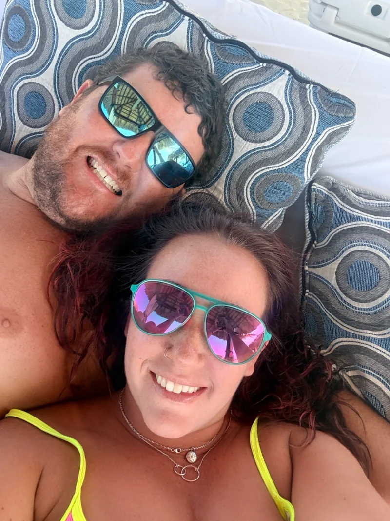 Couple relaxing together during an all-inclusive resort vacation